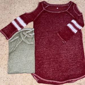Two three quarter length sleeve shirts army green and maroon.